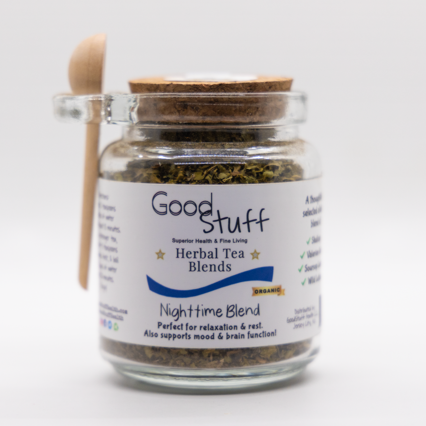Glass jar including a wooden spoon full of an nighttime herbal blend made from Skullcap, Valerian Root, Soursop Leaves, and Wild Lettuce. All alkaline, organic, electric, and vegan.