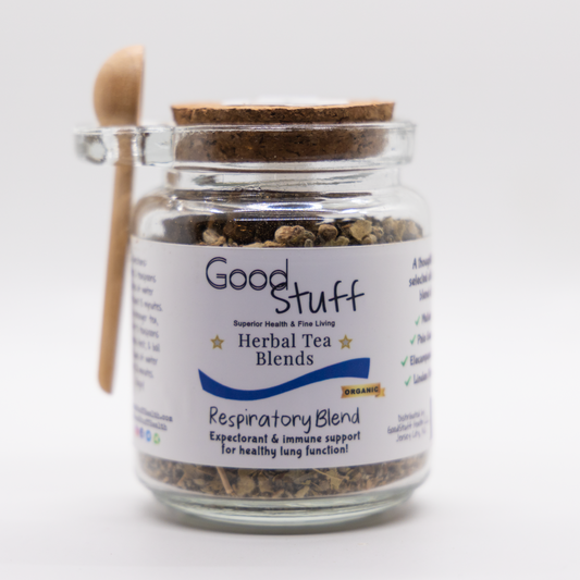 Glass jar including a wooden spoon full of a respiratory herbal blend made from Elecampane, Pau Guaco, Mullein, and Linden Flower. All alkaline, organic, electric, and vegan.